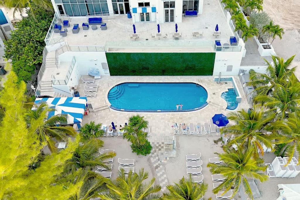 an aerial view of a resort with a swimming pool at Marenas Resort Beachfront Condo with Direct Access in Sunny Isles Beach