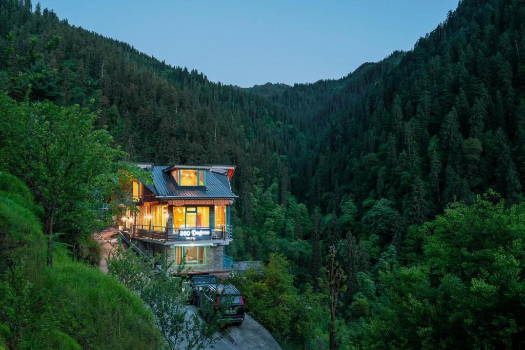 a house in the middle of a forest at Khwaab Stays in Shoja