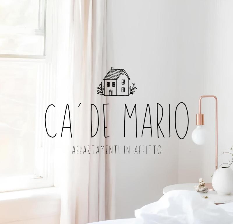 a house decal on a wall in a room at Ca' de Mario in Sondalo