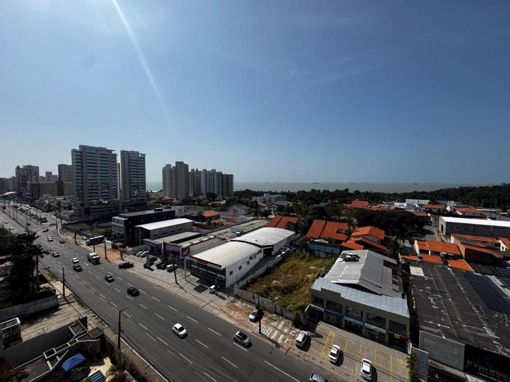 an overhead view of a city with a highway and buildings at STUDIO CALHAU 907 Vista mar in São Luís