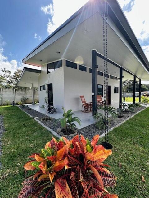 a house with a yard with a pineapple in front of it at Blue Wings Villa in Fortuna