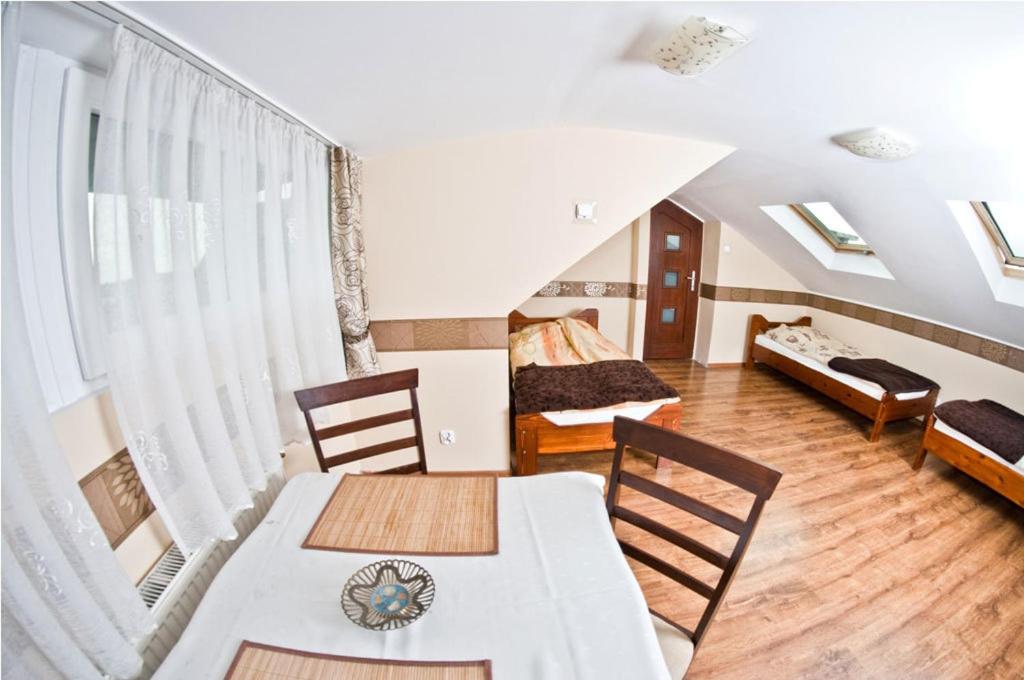 Noclegi ZŁOTA RYBKA - Habitación Cuádruple