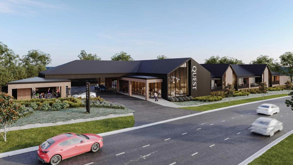 a rendering of a building with a pink car parked in front at Quest Goulburn North in Goulburn