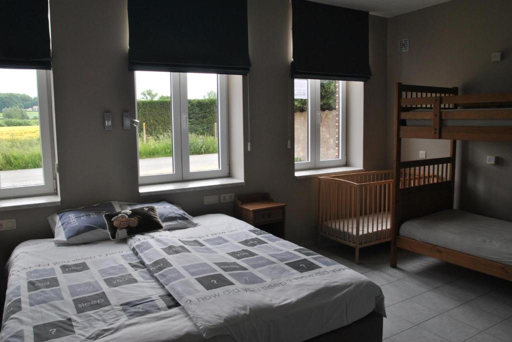 Postel nebo postele na pokoji v ubytování Hoevehotel Ronse