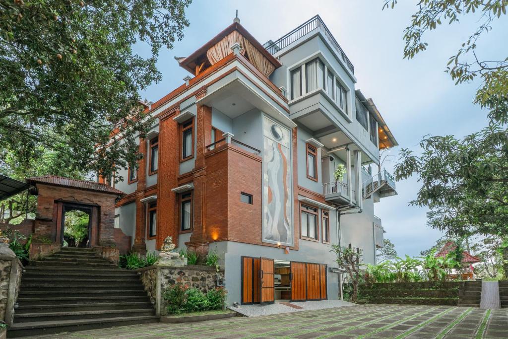 an image of a house at DWM Mandhasativa Homestay By Reccoma in Singaraja