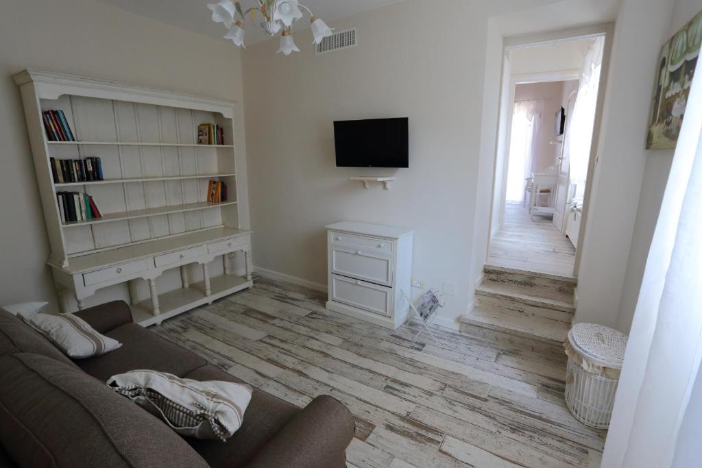 TV a/nebo společenská místnost v ubytování Ambrosio Relais