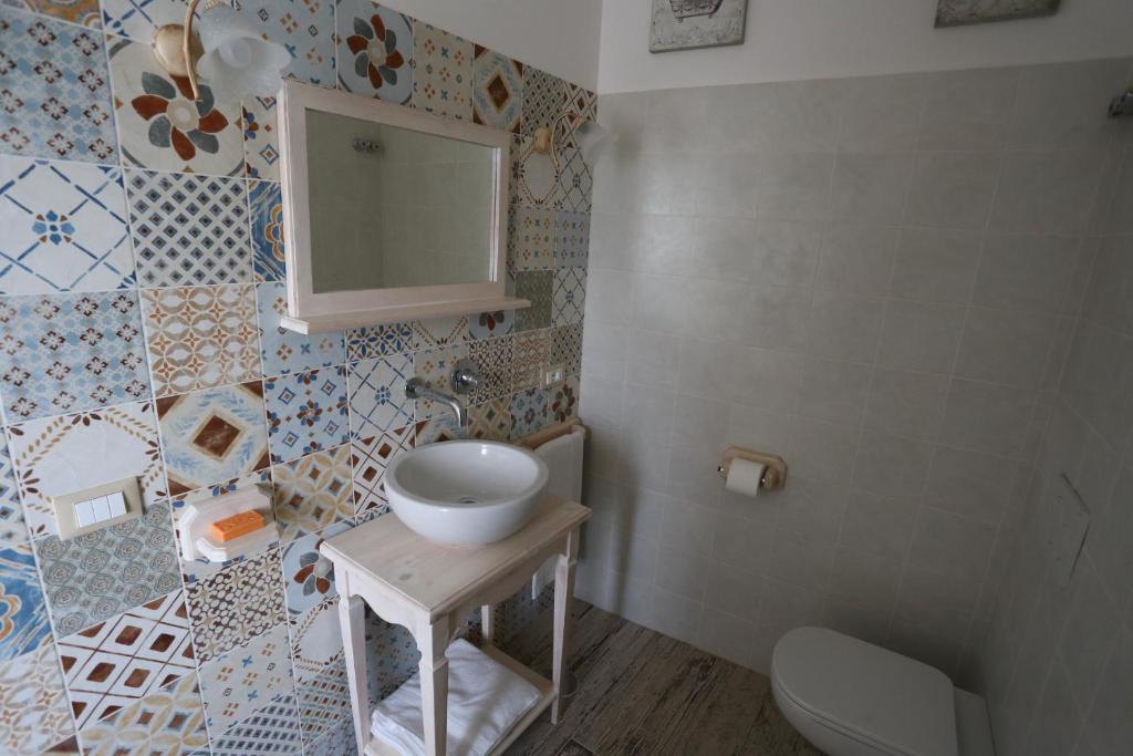 Koupelna v ubytování Ambrosio Relais