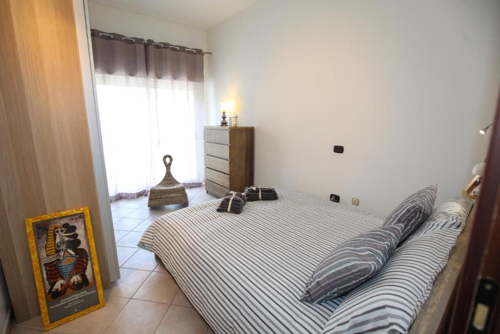 Postel nebo postele na pokoji v ubytování Casa vacanze Letto & Latte