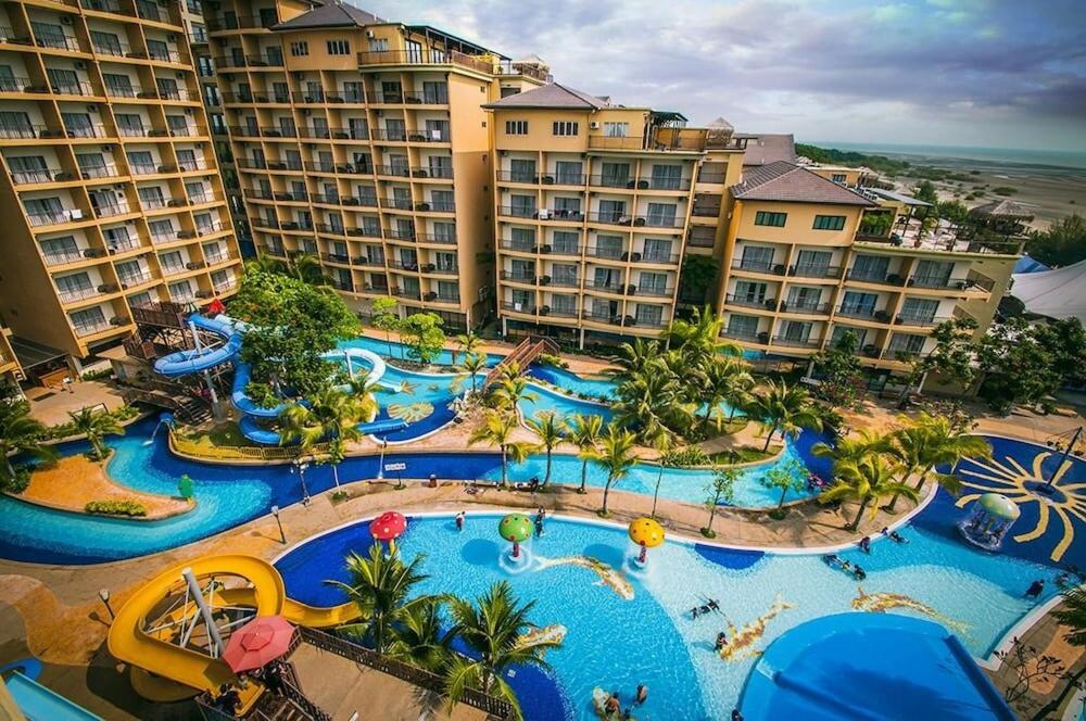 an aerial view of a water park at a resort at Gold Coast Morib Apartment in Banting