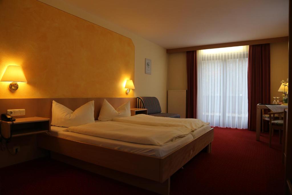 Postel nebo postele na pokoji v ubytování Hotel Köppeleck
