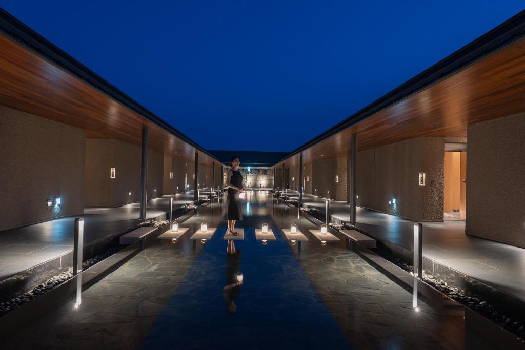 a person standing in a hallway of a building at Mungyeong Sadamjae Stay in Mungyeong