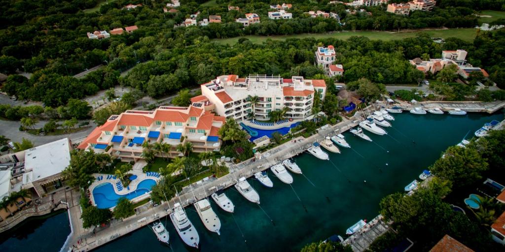 an aerial view of a marina with boats docked at Aventuras Club in Puerto Aventuras
