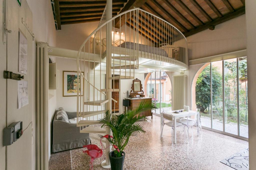 Część wypoczynkowa w obiekcie Relais Pacinotti Apartments