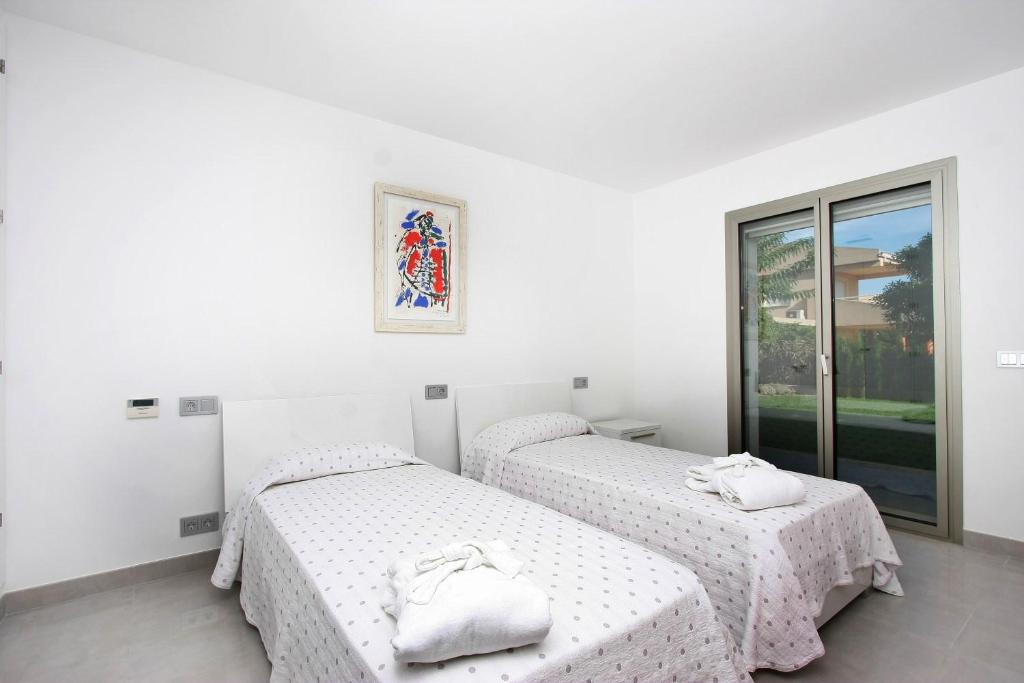 Postel nebo postele na pokoji v ubytování Casa Linda