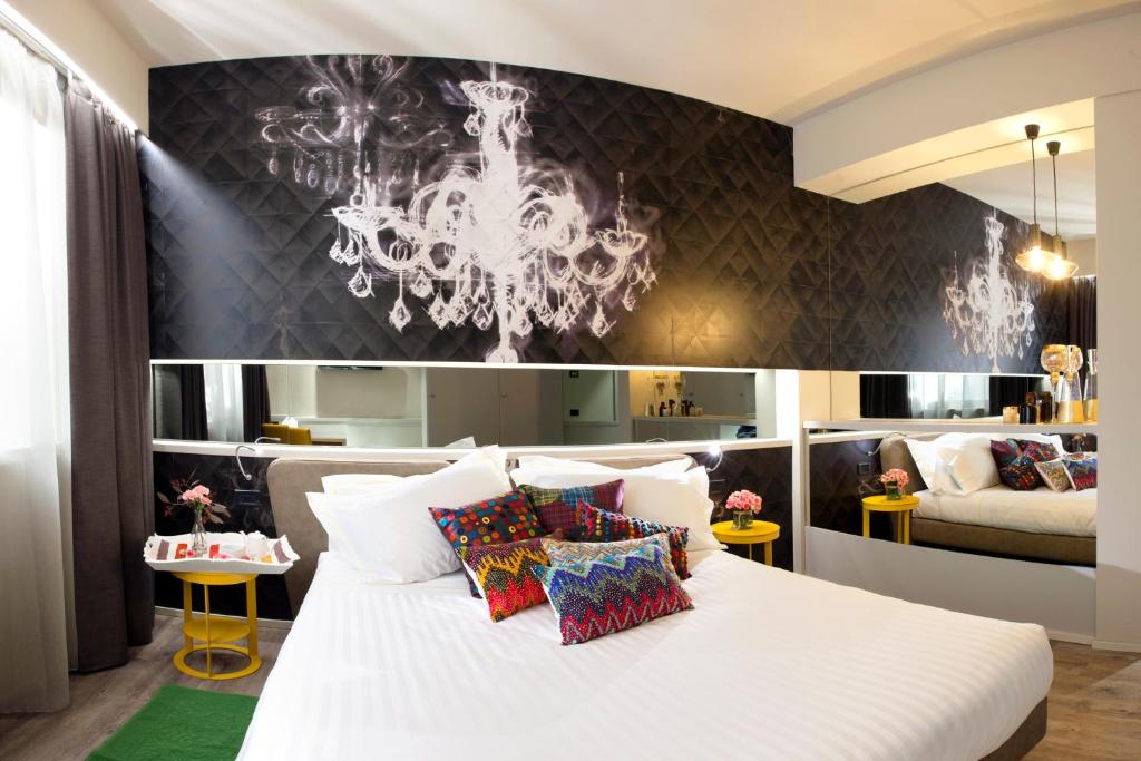 Postel nebo postele na pokoji v ubytování Albavilla Hotel & Co
