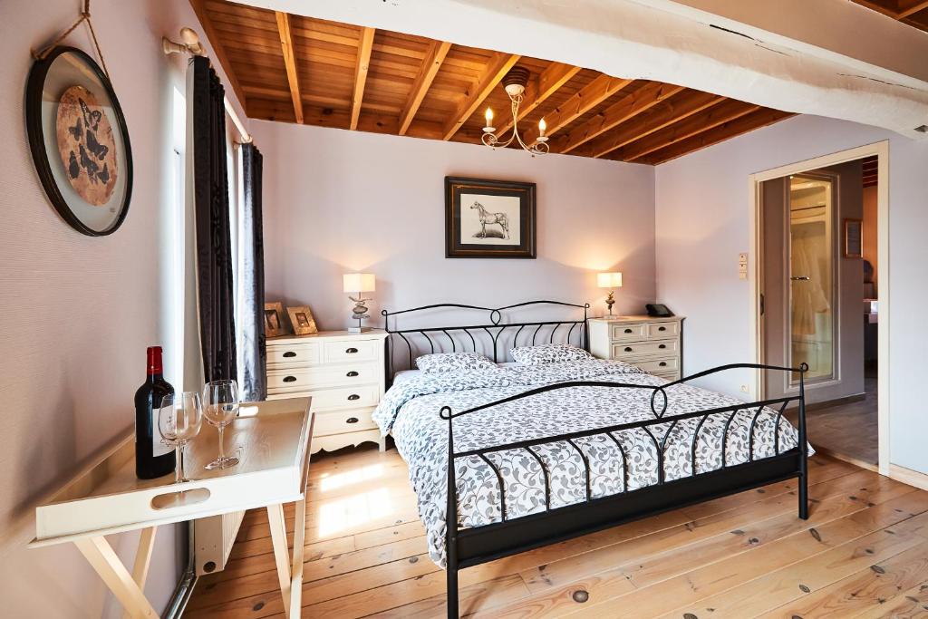 Postel nebo postele na pokoji v ubytování Wellness B&B De Zevenslaper