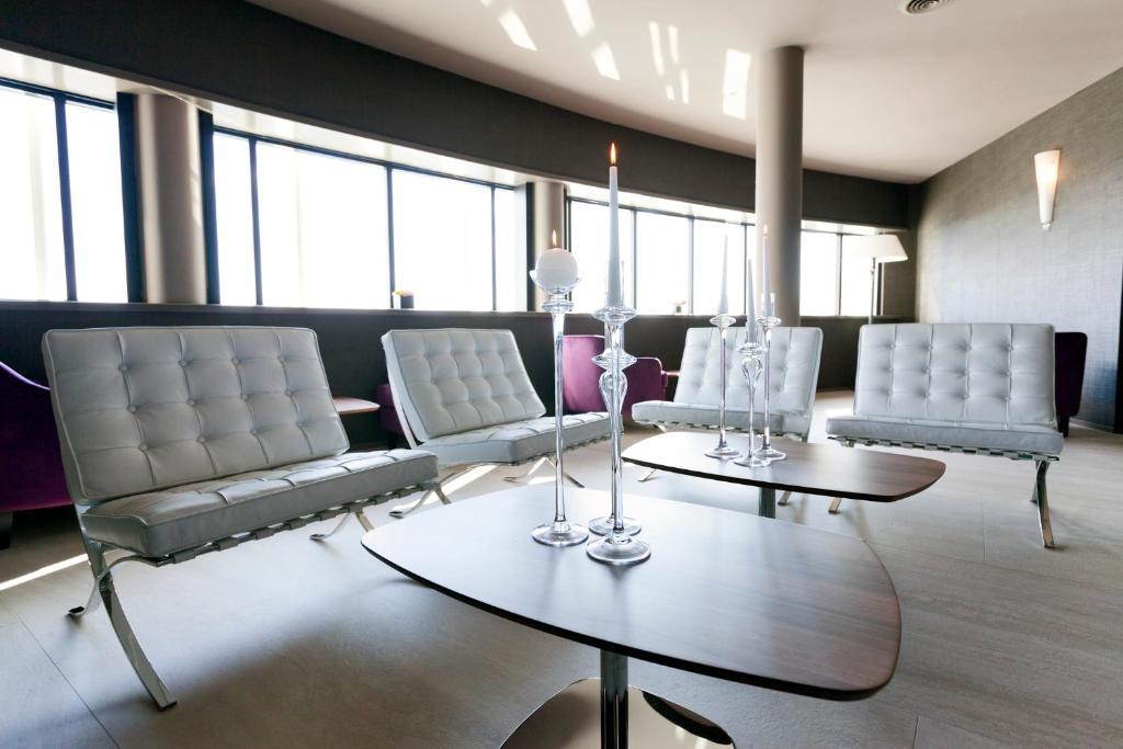 Posezení v ubytování Albavilla Hotel & Co