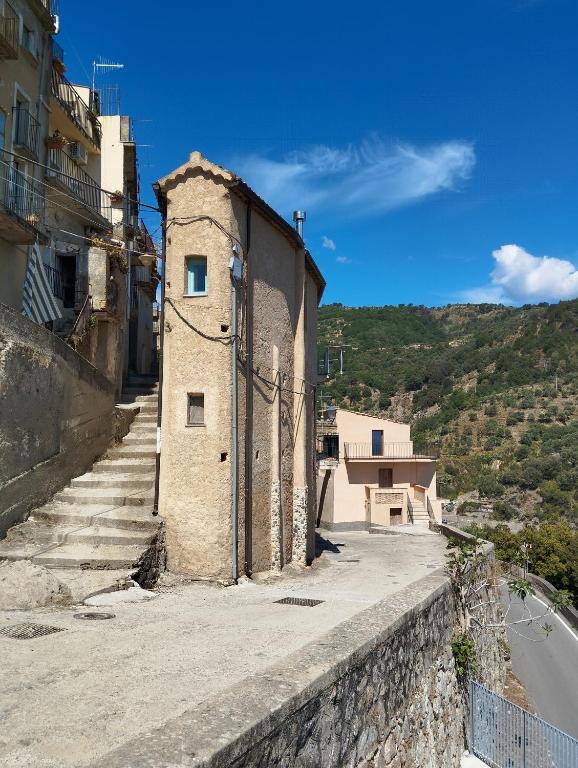 a building on the side of a hill at Casa Adamo 77 in Badolato