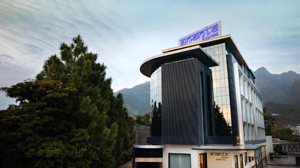 a building with a sign on top of it at Ananta Express, Katra in Katra