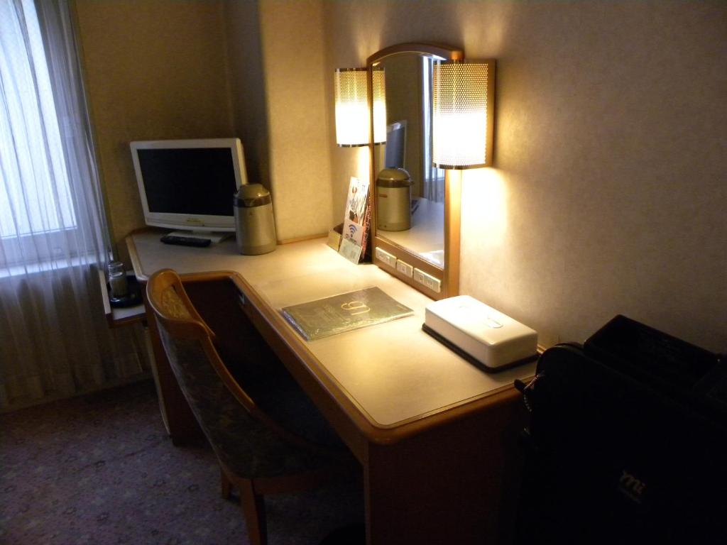 TV a/nebo společenská místnost v ubytování Hotel New Green Okachimachi