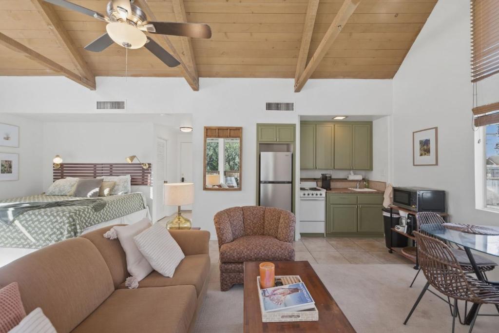 a living room with a couch and a table at Desert Escape with Private Balcony condo in Indian Wells