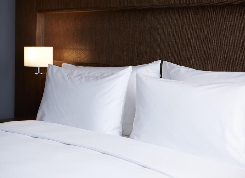 Postel nebo postele na pokoji v ubytování Dusit D2 Kenz Hotel Dubai