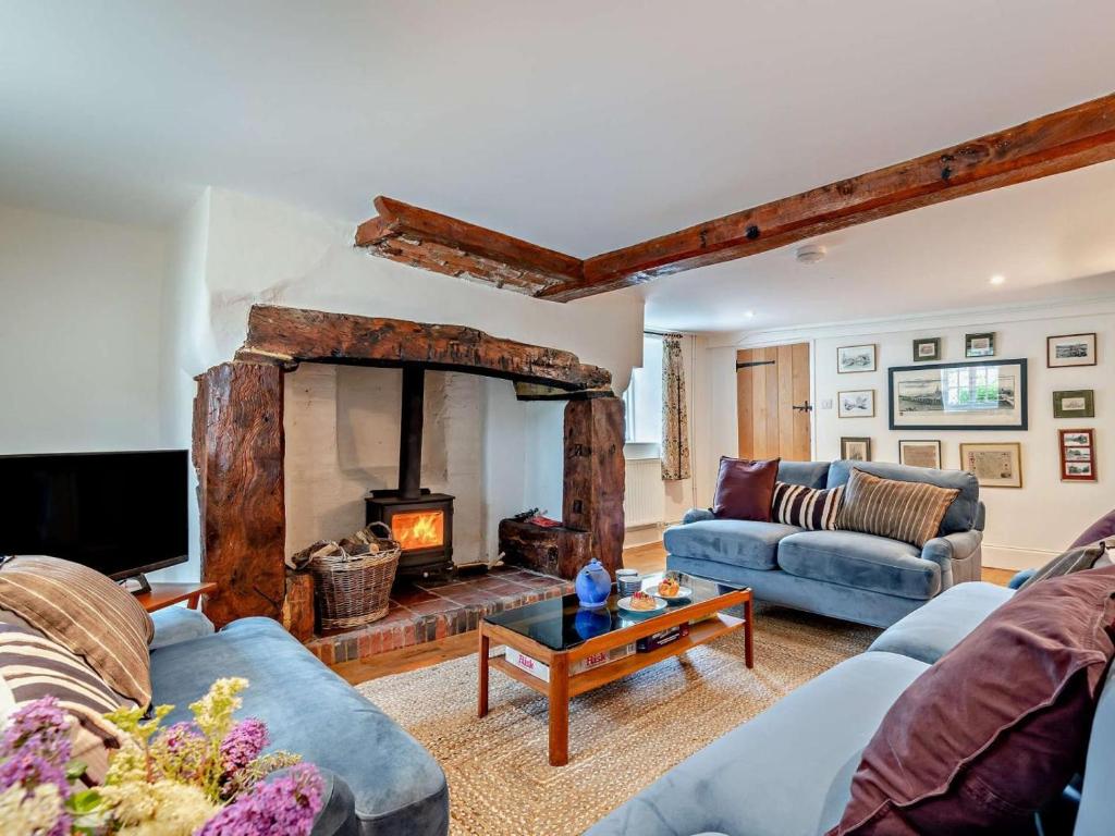 a living room with a couch and a fireplace at 3 Bed in Salisbury oc-95325 in Amesbury