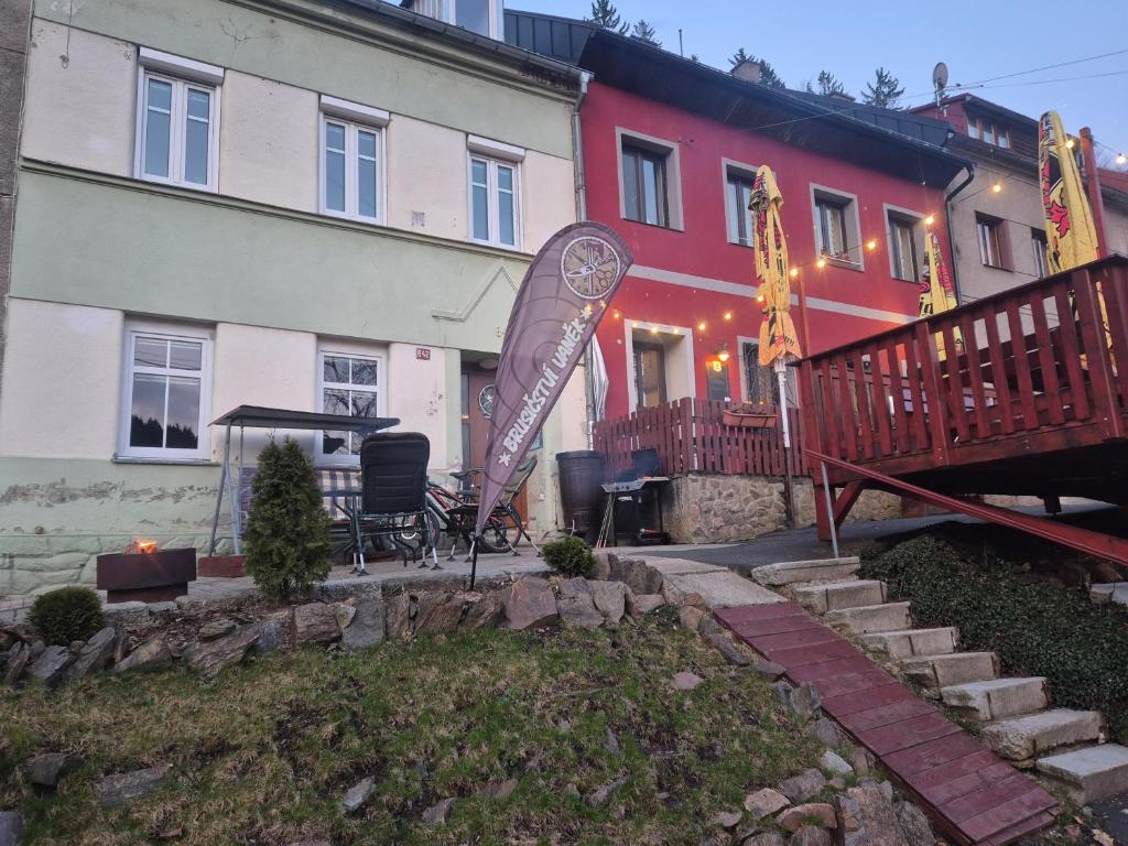 a building with a sign in front of it at Apartmán U Vaňků in Jáchymov