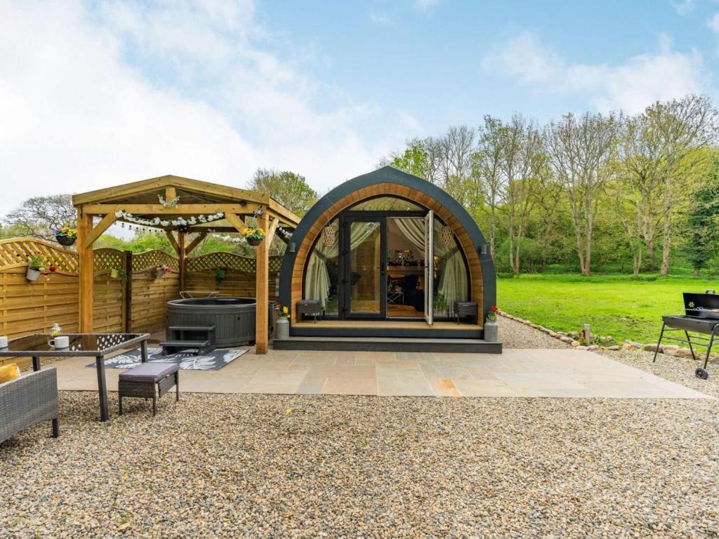 a gazebo with a grill in a garden at 1 Bed in Consett oc-87933 in Shotley Bridge