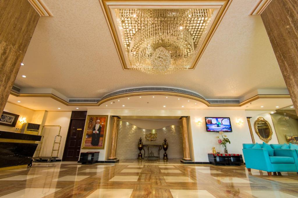 TV a/nebo společenská místnost v ubytování Caesar Hotel