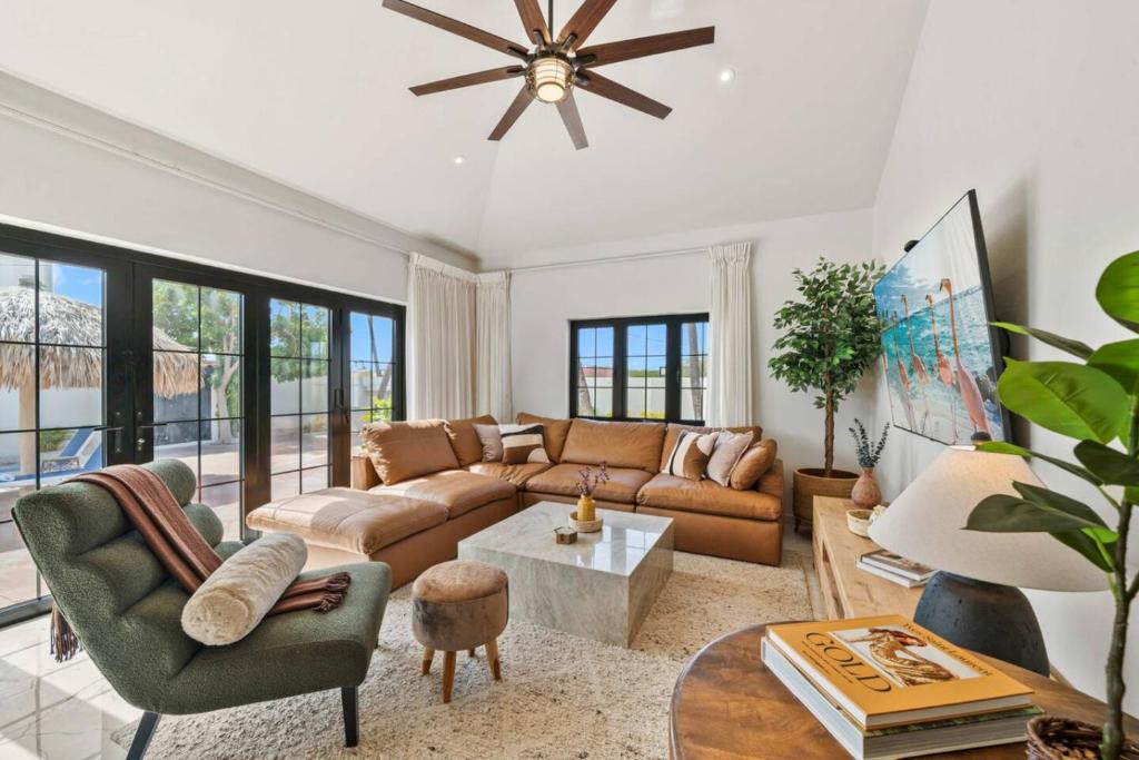 a living room with a couch and a table at Alto Vista 63 in Noord