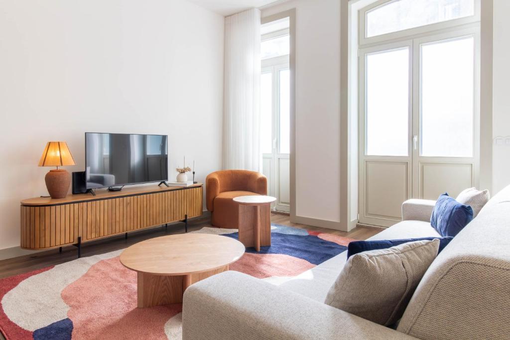 Elegant 2BR w Patio by LovelyStay