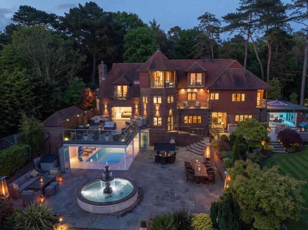 an aerial view of a house with a swimming pool at Hamble House in Southampton