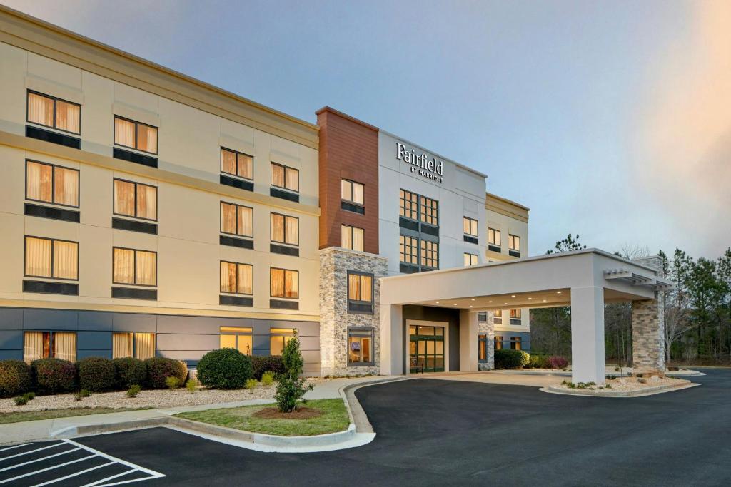 a rendering of the front of a hotel with a parking lot at Fairfield by Marriott Inn & Suites LaGrange in La Grange
