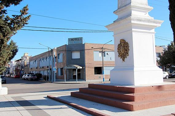 a monument on the side of a city street at Hotel San Martín in Santa Rosa