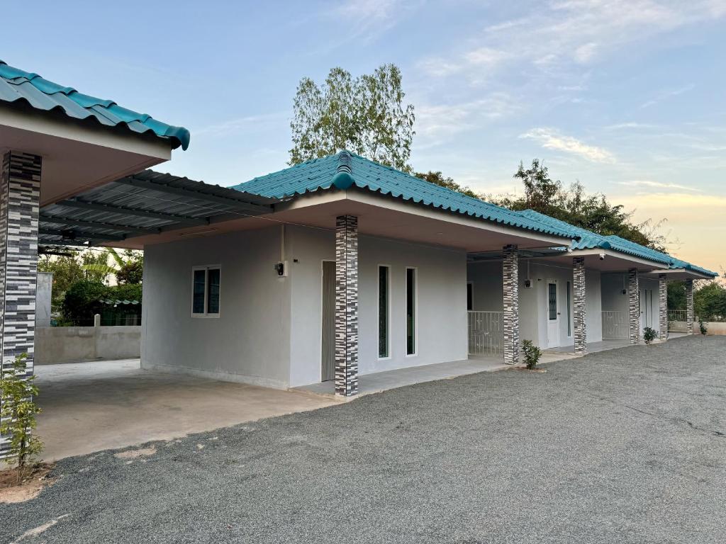 a rendering of a house with a driveway at Sunshine Rest Resort in Ubon Ratchathani