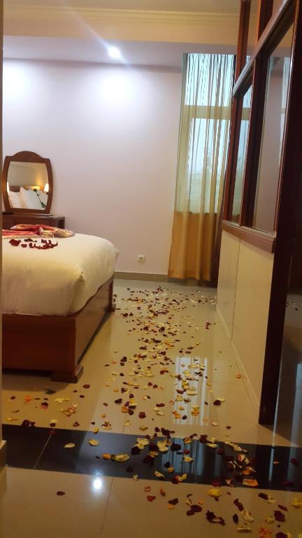 Postel nebo postele na pokoji v ubytování C Fun Addis Hotel