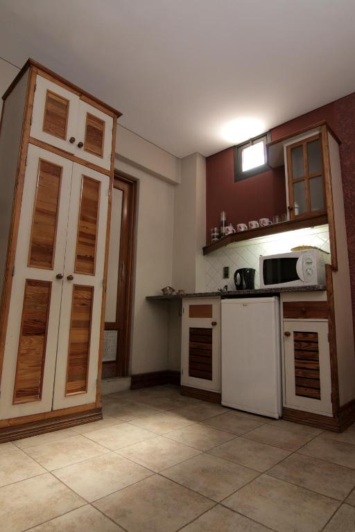 Kuchyň nebo kuchyňský kout v ubytování Hotel Xumec Mendoza