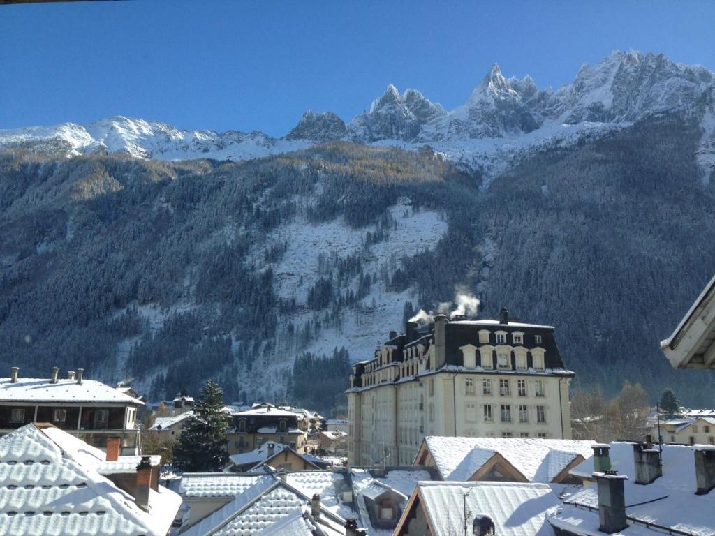 a view of a city with snow covered mountains at Villa Jules in Chamonix
