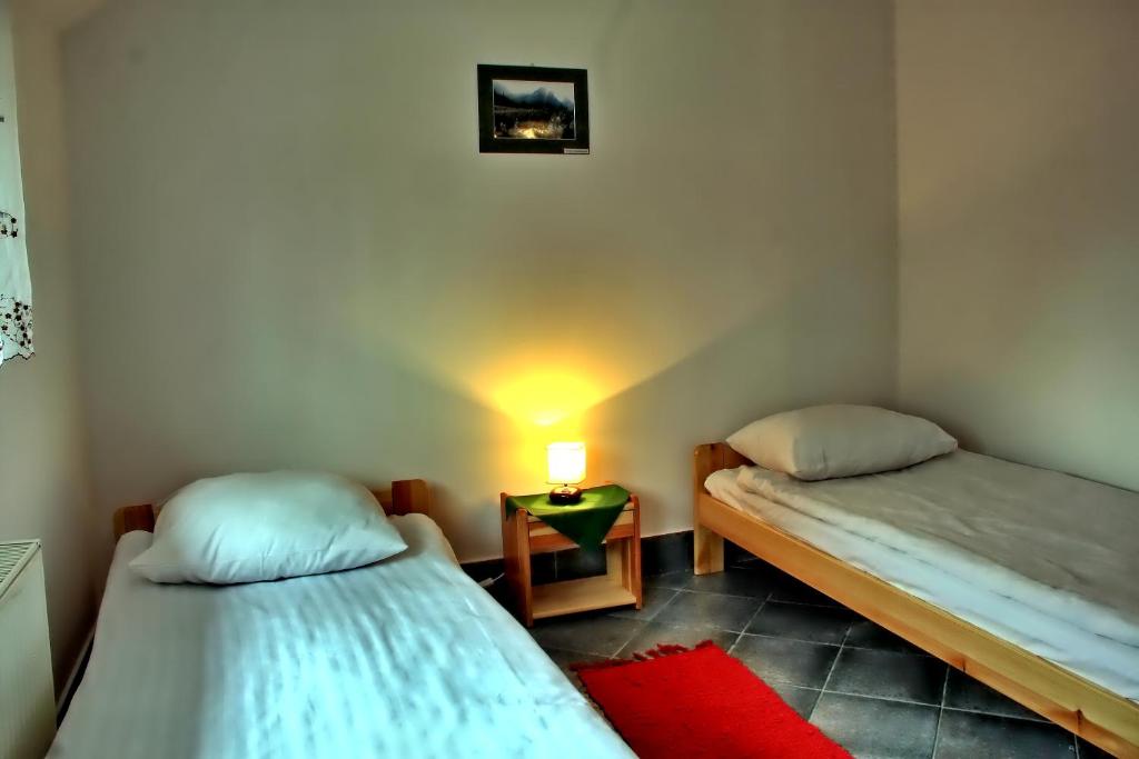 Posteľ alebo postele v izbe v ubytovaní Camping Pod Krokwią
