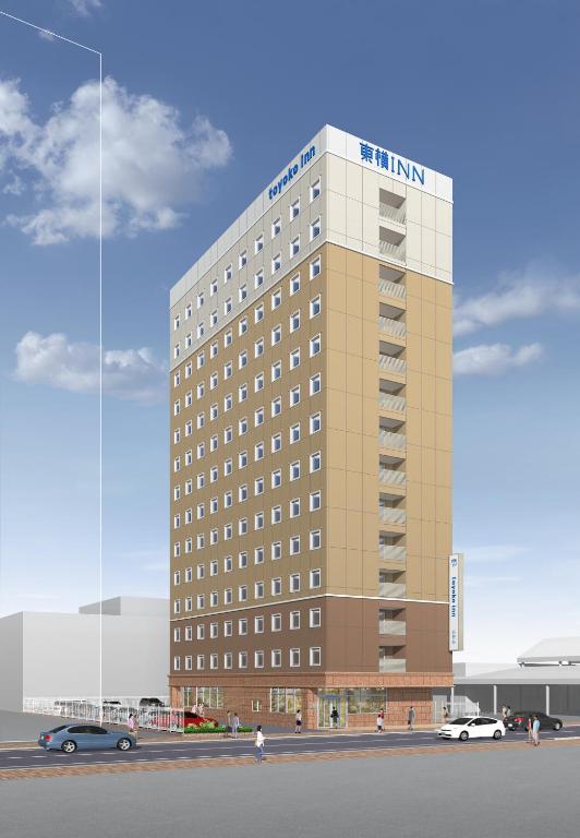 a rendering of a hotel building with cars parked in front at Toyoko Inn Kure-eki in Kure