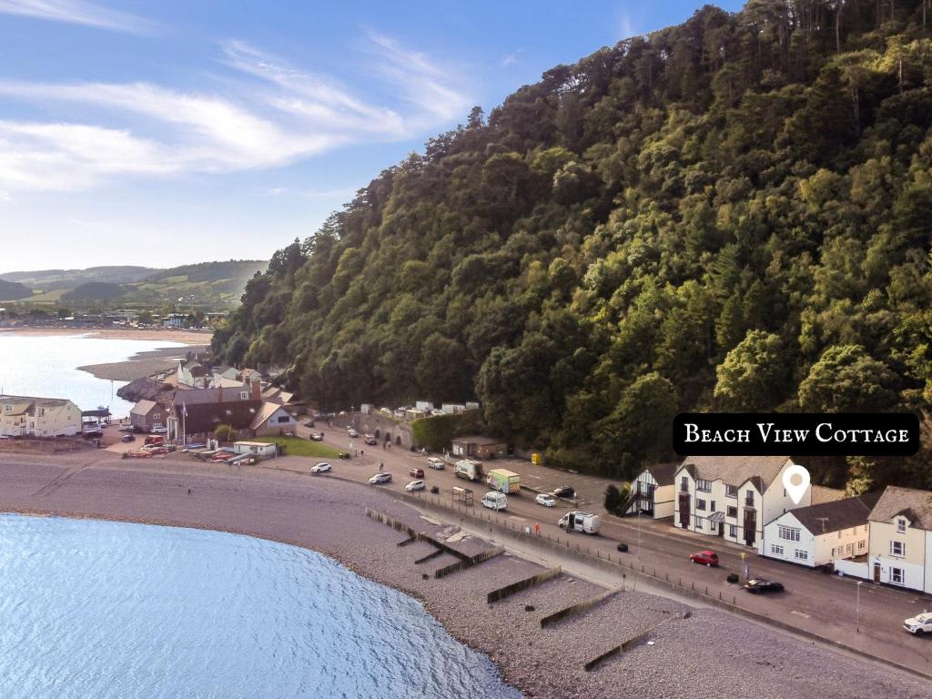 an aerial view of a beach with a mountain at Beach View Cottage Minehead in Minehead