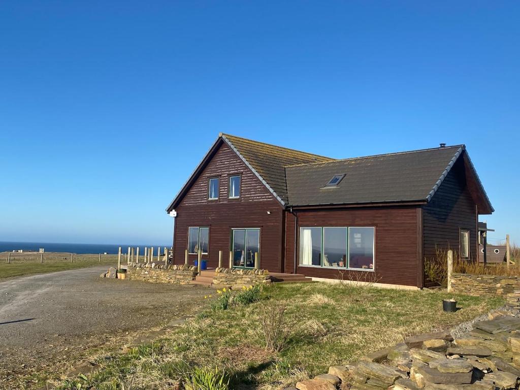 a house on the side of a road at Grunkeys - PLEASE NOTE these are rooms in my home, not a separate property in Orkney