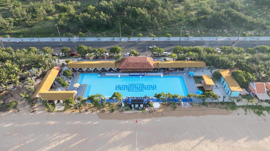 an aerial view of a resort with a swimming pool at Ana resort Phu Yen in Liên Trì (4)