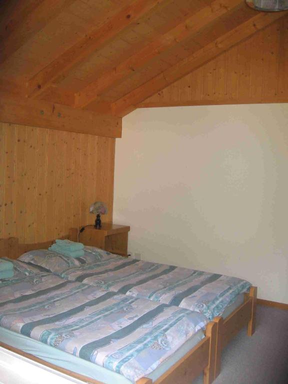 Postel nebo postele na pokoji v ubytování Hotel-Restaurant Stechelberg Bed & Breakfast