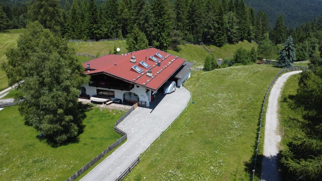 an aerial view of a house with a red roof at Panorama Quartier Seefeld in Seefeld in Tirol