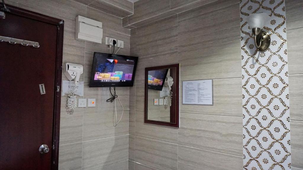 TV a/nebo společenská místnost v ubytování Australian Guest House
