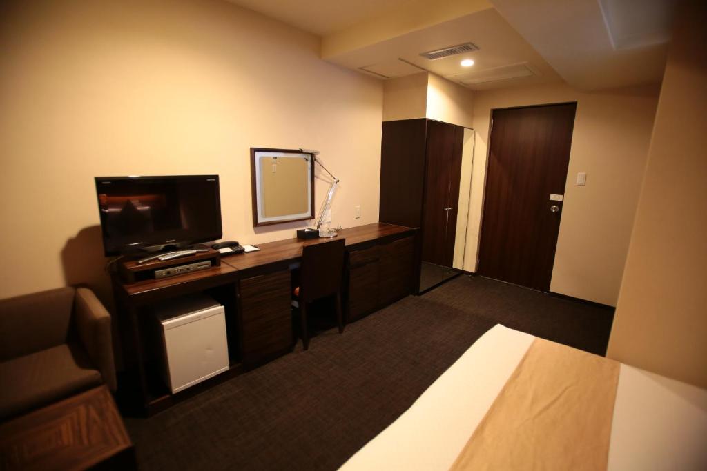 TV a/nebo společenská místnost v ubytování International Hotel Ube
