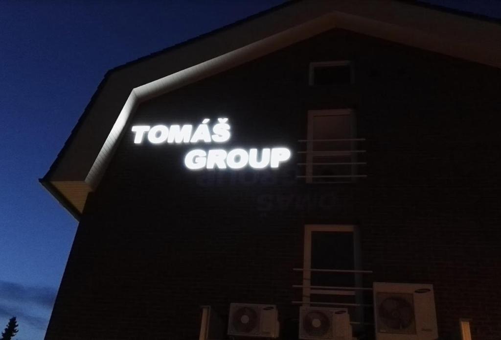 a sign on the side of a building at Penzion U Tomáše in Ratíškovice