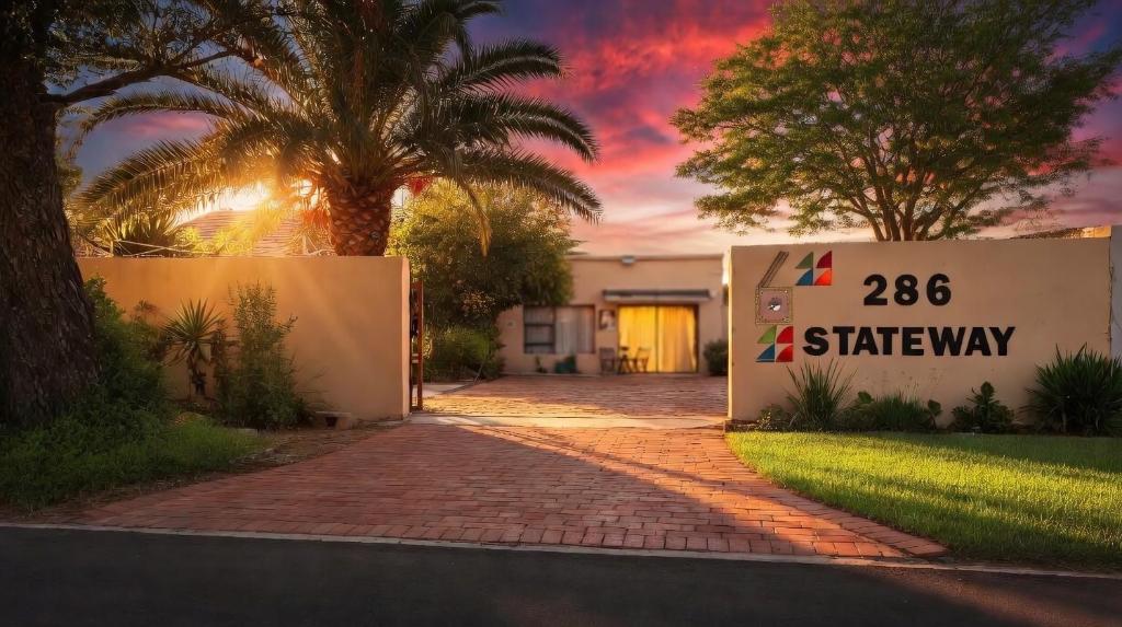 a building with a sign that saysza starway at Romaic Guesthouse Welkom in Welkom